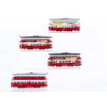 Four motorised Corgi 00 Gauge 'Feltham' Bogie Trams, now fitted with 'Bec-type' motor units to