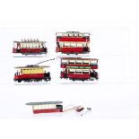 Four Kitbuilt motorised 00 Gauge London Transport 4-wheel Trams, all in LT red/cream livery and each