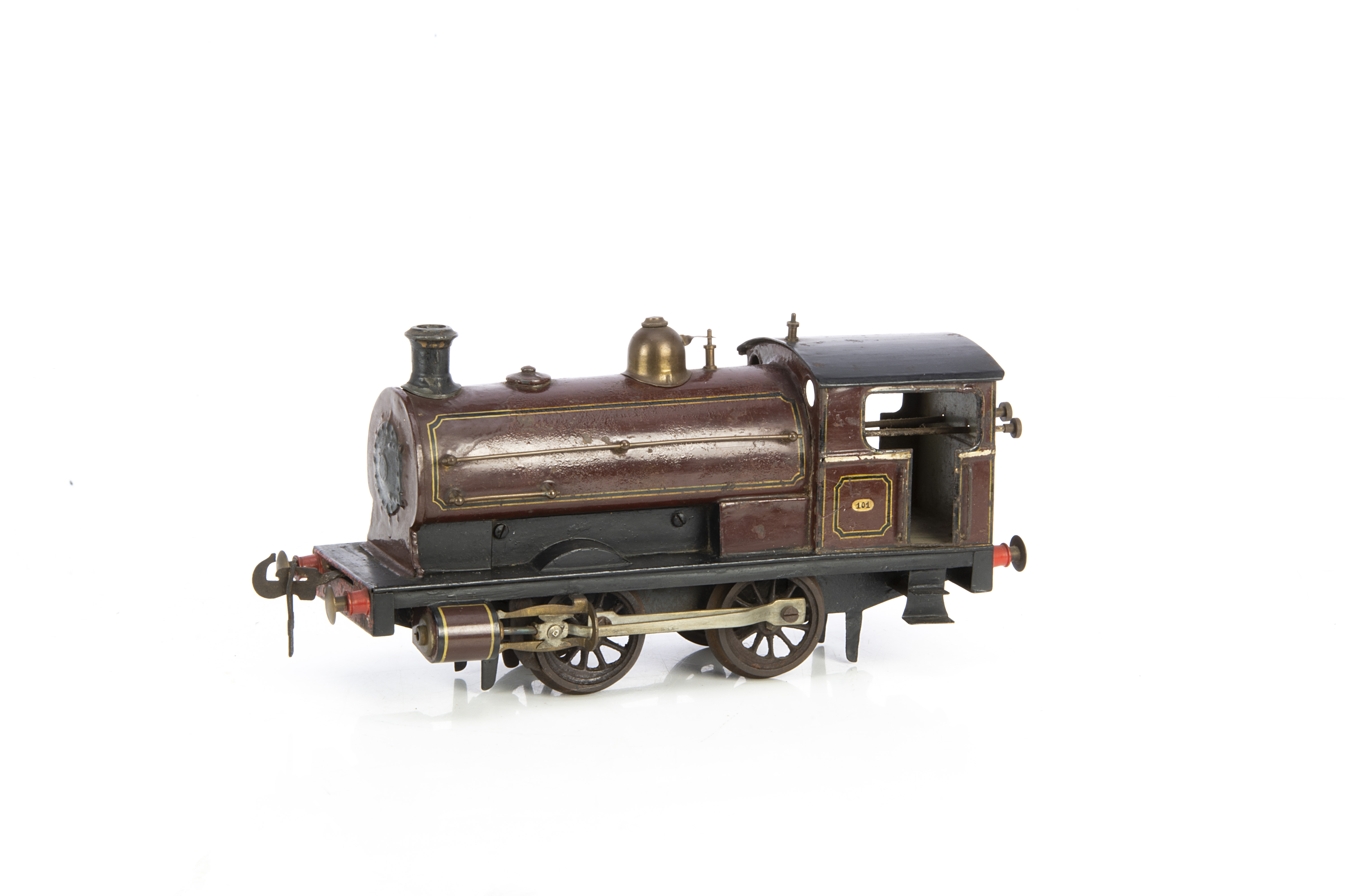 An early Carette/Bassett-Lowke Gauge 1 clockwork 'Peckett' 0-4-0 Saddle Tank Locomotive, in lined