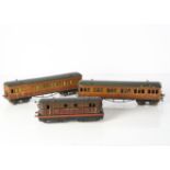 A Hornby 0 Gauge clockwork 'Metropolitan Electric' Locomotive and Coaches, a later example with