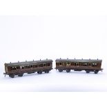 Two uncommon Bing for B-L Gauge 1 GWR crimson '1921-series' Bogie Coaches, a 1st class corridor