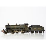 An uncommon Bassett-Lowke 0 Gauge clockwork GWR 'Mogul' 2-6-0 Locomotive and Tender, in (loco