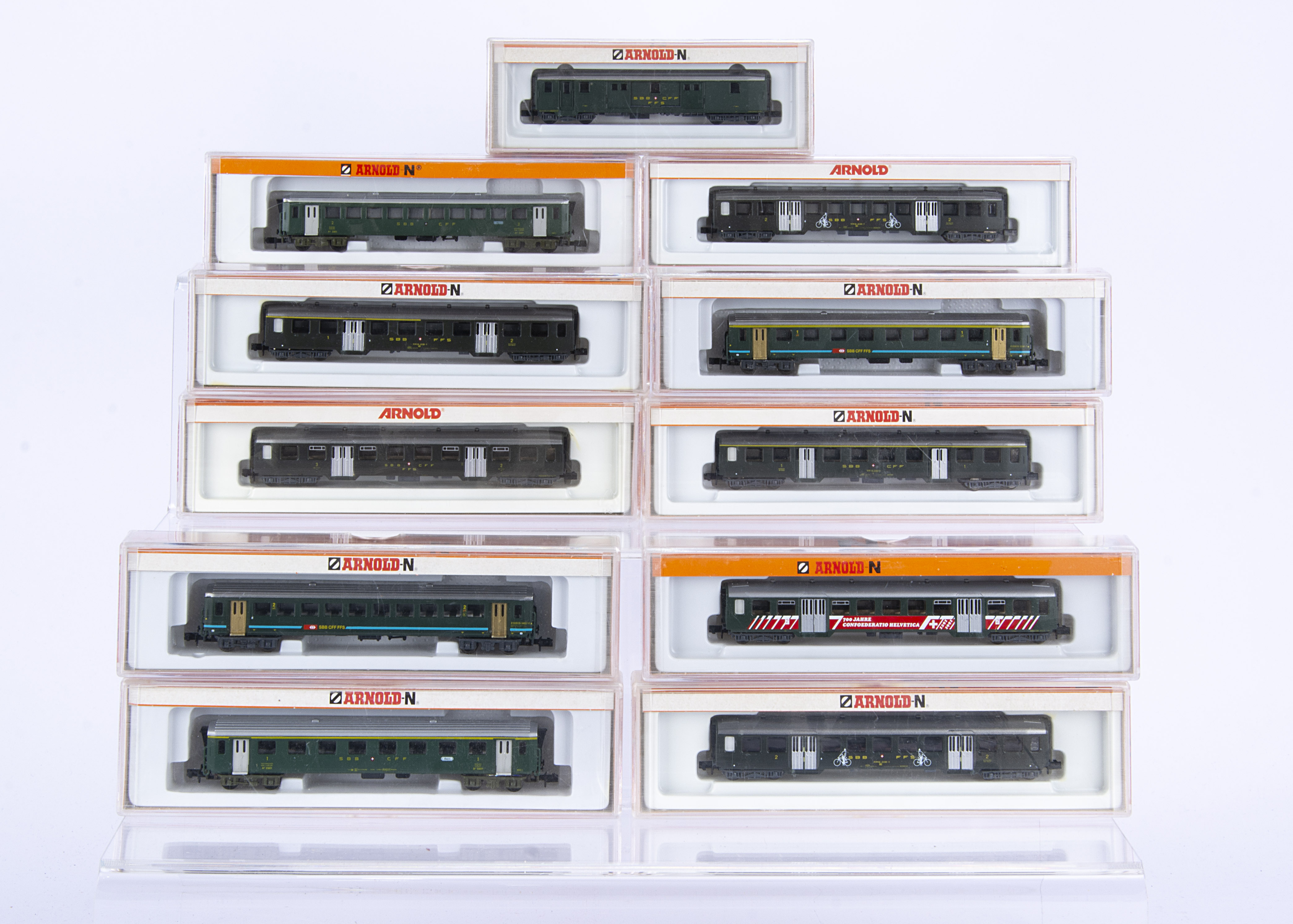 Arnold N Gauge Swiss Coaching Stock, a cased group all SBB in green livery, 3704, 3703, 3703 CH,