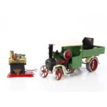 A Mamod spirit-fired SW1 Steam Wagon and MM1 Engine, the SW1 in green with red trim and (