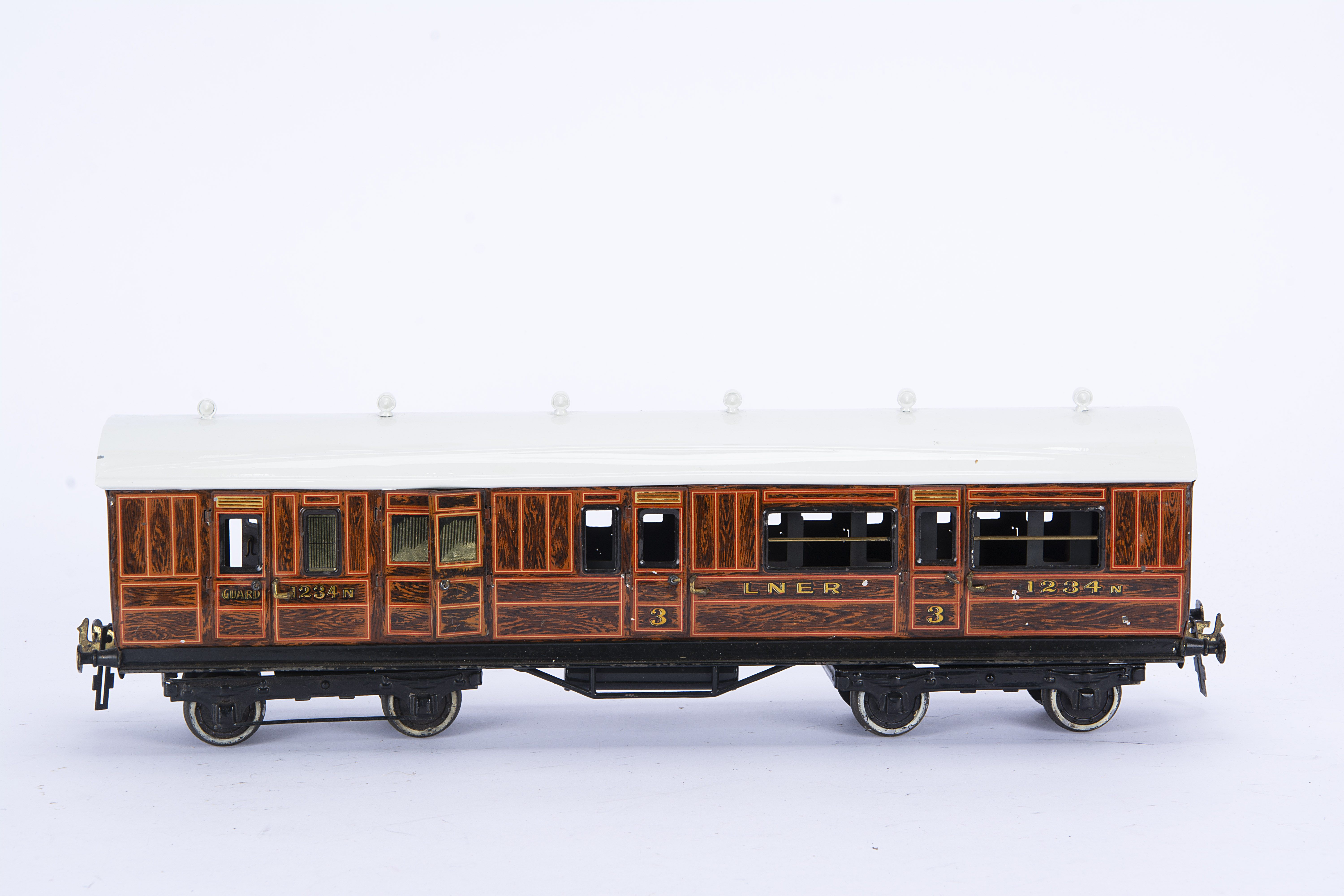 A Bing/Bassett-Lowke Gauge 1 LNER Brake/3rd Coach, in lithographed 'teak' as No. 1234N with