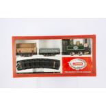 A Mamod 0 Gauge Live Steam RS1 Goods Train Set, with SL1 green locomotive with white lettering and