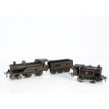 A Hornby 0 Gauge No 2 clockwork 4-4-0 Locomotive and Tender, in LMS lined black as No. 2711, F, mech