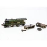 A Hornby 0 Gauge clockwork 'Caerphilly Castle' Locomotive and spare mechanisms, the loco in lined