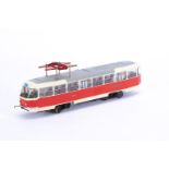 A modified and motorised 0 Gauge Prague Tatra T3 type tram by Premium Classixxs, in Prague red/cream