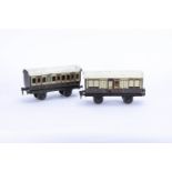 Two early Märklin Gauge 1 L&NWR Four-wheeled Coaches, in lithographed L&NWR plum and ivory, one