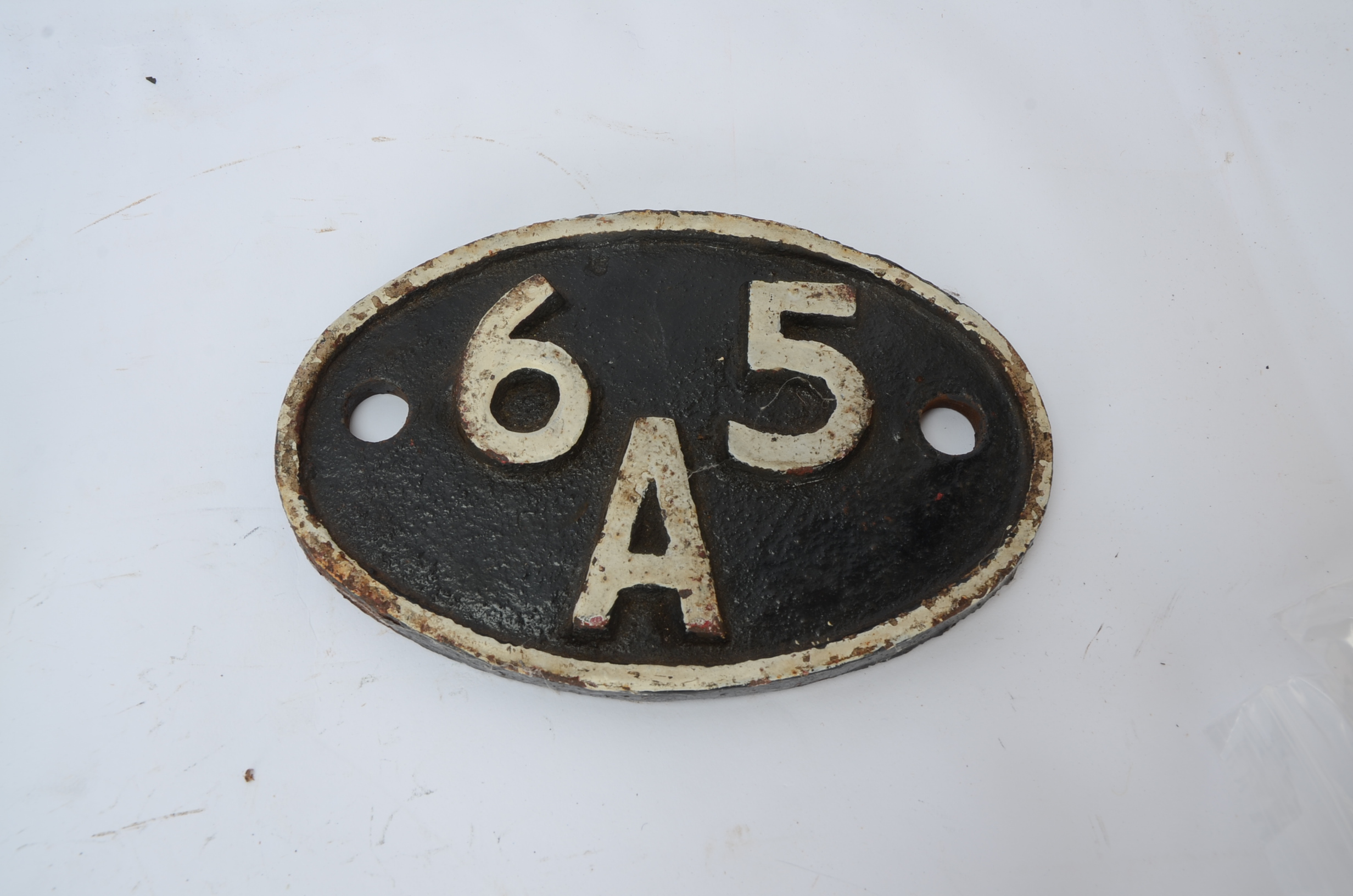 Scottish Cast Iron Shed Plate, oval shed plate possibly repainted from Eastfield Glasgow, 65 A white