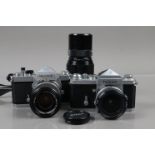 Two Nikon SLR Cameras, a Nikon F, serial no 7076310, with eye level finder, shutter working, self