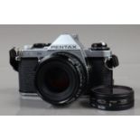 A Pentax ME Super SLR Camera, shutter working, meter responsive, self timer working, body G, some