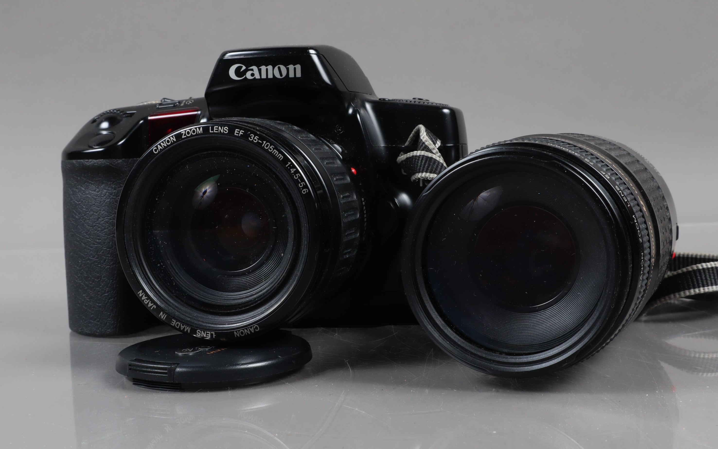 A Canon EOS 10 SLR Camera, powers up, shutter working, meter responsive, flash working, body G, with