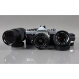 An Olympus OM-2 SLR Camera, shutter working, meter responsive, self timer working, body G, with