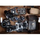 A Tray of Various Cameras, including a Zeiss Ikon Ikoflex I, an Olympus OM-1 body, a Minolta 7000,