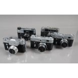 Five Soviet Cameras, a FED Revue 3, a FED 3, a FED 4, a FED 5B and a Zenit 3m. Shutters working,
