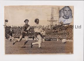 BOBBY MOORE / AUTOGRAPH A 10" X 7" b/w action Press photo of Moore in action for England away v