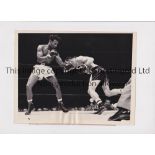 BOXING PRESS PHOTO / SUGAR RAY ROBINSON An original 9" X 7" b/w Press photo with stamp and paper