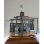 RHYMNEY AWARDS FOR COLLECTION ONLY Large 20" X 17" wooden trophy with a single athlete at the top