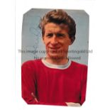 DENIS LAW / AUTOGRAPH A sign magazine picture of Law in a Manchester United top. Good