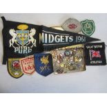 ATHLETICS BADGES Approximately 30 metal badges relating to clubs and meetings plus cloth blazer