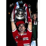 BRYAN ROBSON / AUTOGRAPHS Two 12 X 8 photos of the Man United captain holding aloft the FA Cup