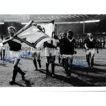 SCOTLAND / AUTOGRAPHS A 12 X 8 photo of Scotland players Davy Wilson and Willie Henderson parading