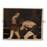 BOXING PHOTOS / TERRY SPINKS Four original b/w Press photos with stamps and 3 have paper notations