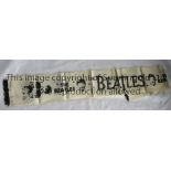 BEATLES MEMORABILIA Beatles Scarf (42" x 5.5") Circa 1964. A large "The Beatles" and various