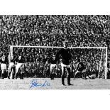 DENIS LAW / AUTOGRAPH A 12 X 8 photo of the Scottish forward turning his back on play as Northern