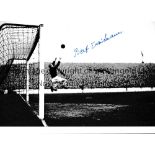 BERT TRAUTMANN / AUTOGRAPH A 12 X 8 photo of the Manchester City goalkeeper making a save against