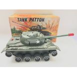 A Tinplate/ plastic Patton Tank.Boxed - NO RESERVE