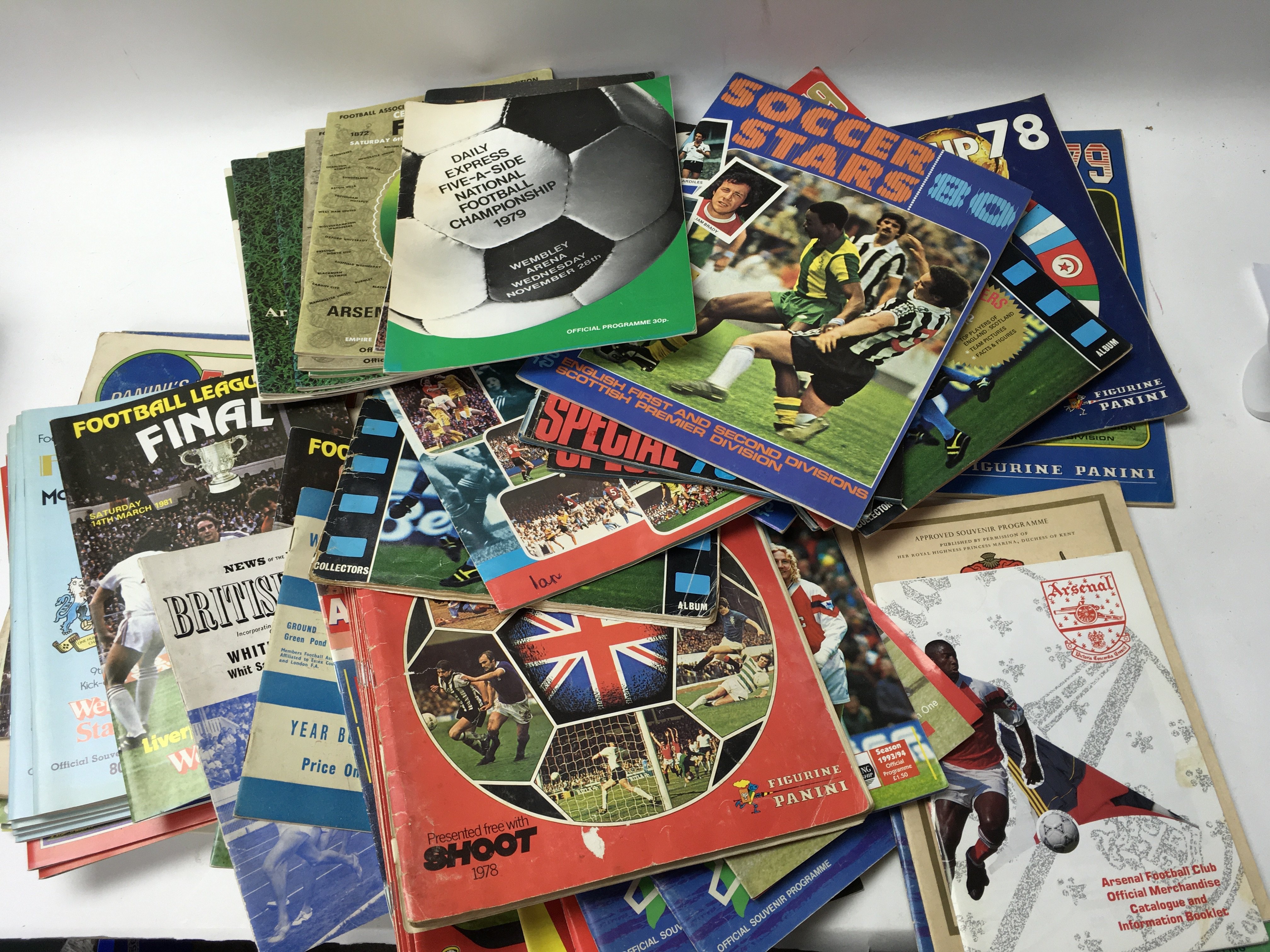 A Collection of football programmes and magazines.