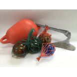 A collection of nautical items comprising glass fi