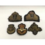 Five bullion wire military cap badges.