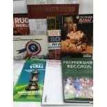 A collection of sporting books, programs etc.