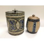 A Doulton Lambeth biscuit barrel with a silver pla