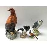 A group of four Beswick birds including an eagle d