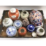 A box of Oriental ceramics comprising vases and gi