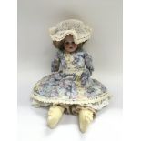 A good quality porcelain doll by Heubach Koppelsdo