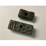2 early carved stone (possibly Inuit art) fire sto