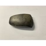 A small Neolithic polished stone are head.