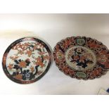 Two late 19th Japanese Imari plaques one damaged.