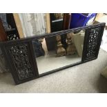 A hardwood framed Chinese wall mirror, approx 93cm