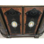 A Victorian gilt metal burr maple credenza the cen