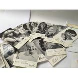 A collection of photos including signed coronation street photographs.