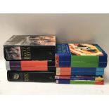 7 Harry Potter books, 4 that are first editions.