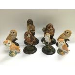 Two Beswick owls and six by Country Artists figure