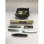 Five smoker's knives, pewter ashtray and pipe clea